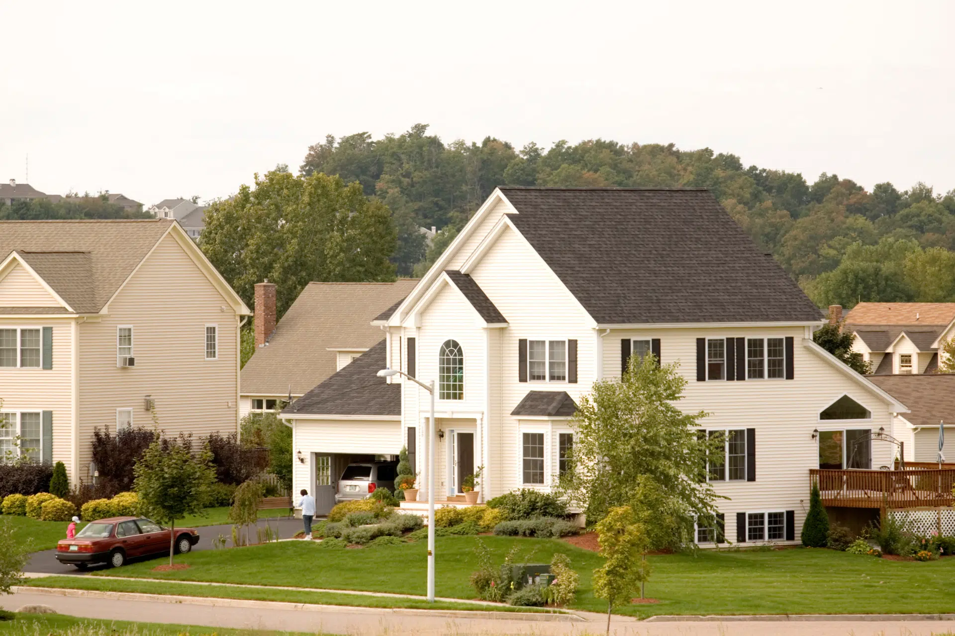 A white house with a new roof.