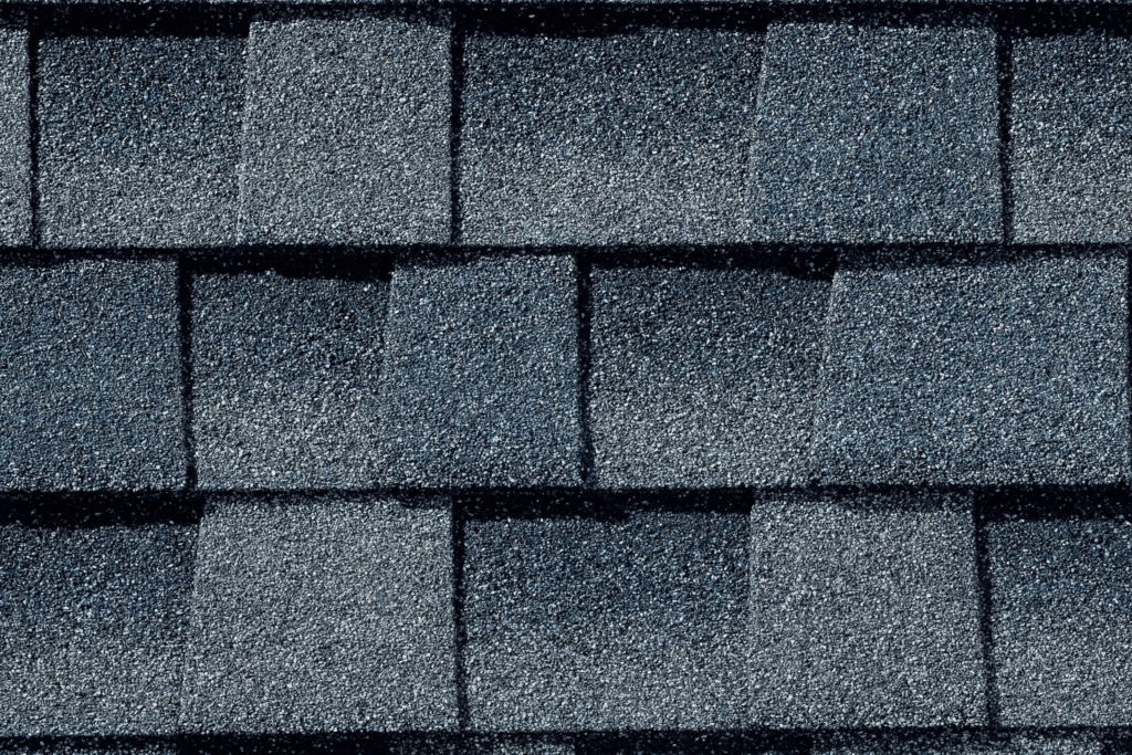 5 Essential Roofing Tips for Homeowners 1 A beautifully designed home with Timberline HDZ Biscayne Blue shingles, illustrating essential roofing tips for homeowners looking for high-quality, weather-resistant roofing materials.