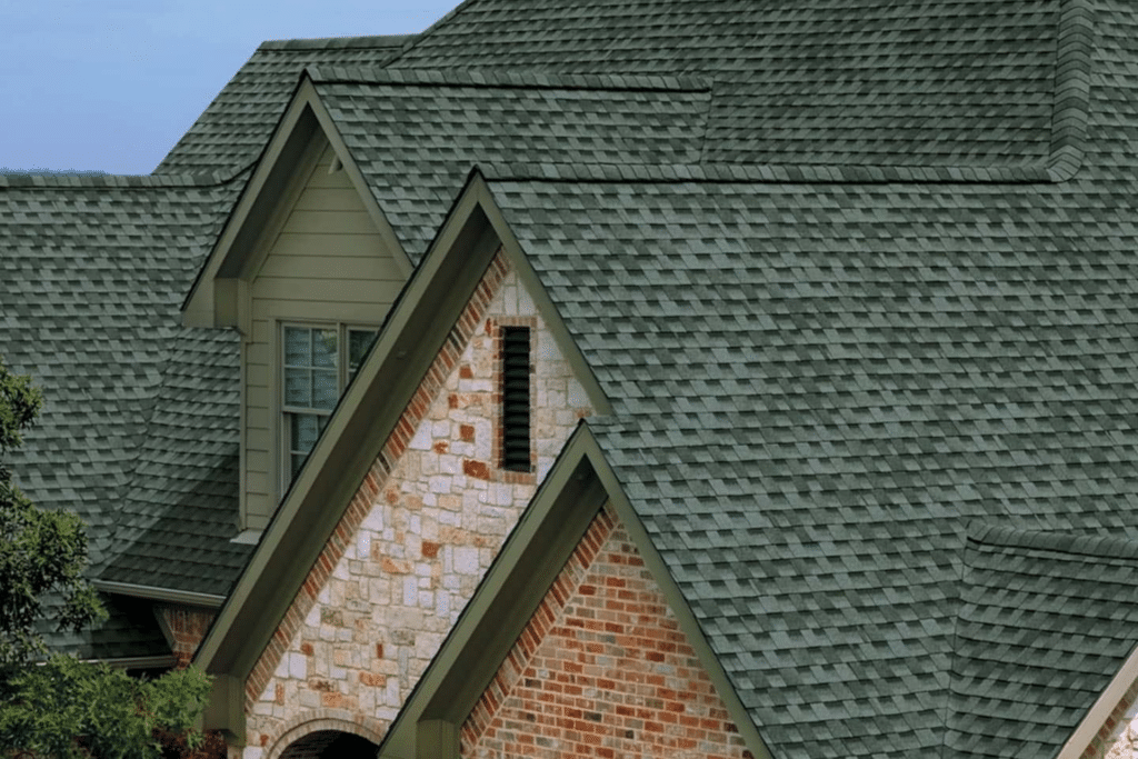 5 Essential Roofing Tips for Homeowners 2 A stunning house featuring Timberline HDZ Slate shingles, demonstrating essential roofing tips for homeowners seeking long-lasting, high-performance roofing solutions.